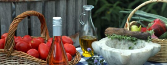 Rosé wine and gazpacho served outdoors in Mendoza Argentina with fresh tomatoes and olive oil